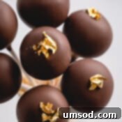 small image of chocolate cake pops with gold luster.