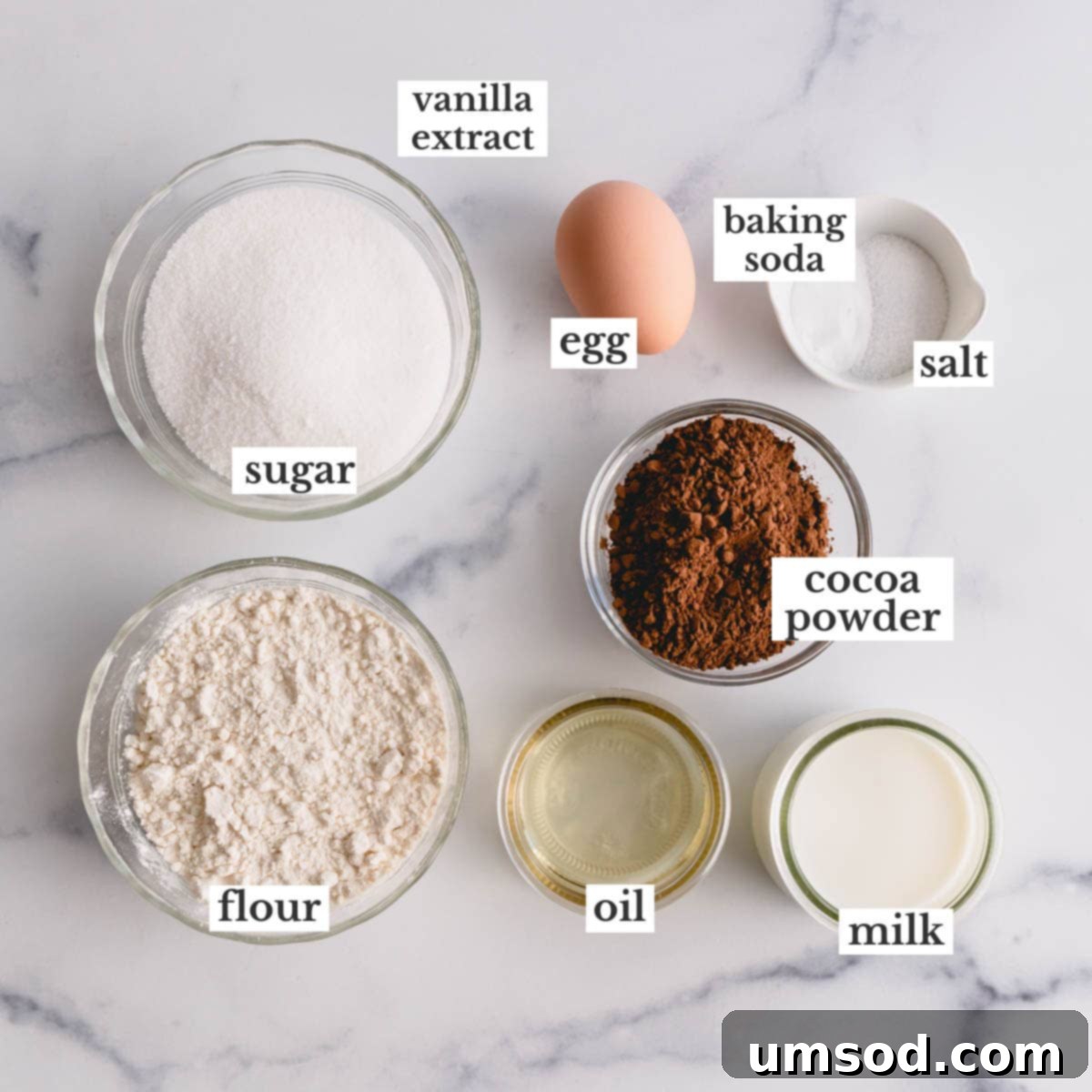 ingredients laid out for preparing a chocolate cake.