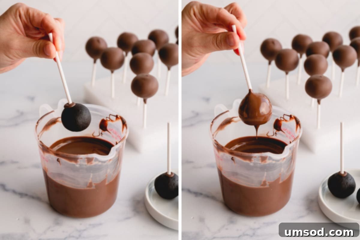 hand dipping chocolate cake pops into smooth melted chocolate coating.