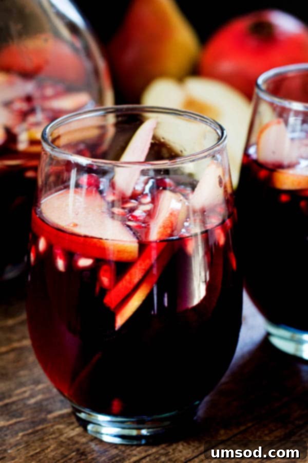 Autumn Harvest Sangria 3 Make-ahead party drink filled with fabulous fall fruits! Easy sangria for a crowd!