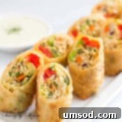 Crispy Chicken Avocado Egg Rolls - A delightful fusion dish perfect for any occasion.