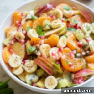 Fresh Fruit Medley 7 A vibrant bowl of fruit salad with a perfect round shape.