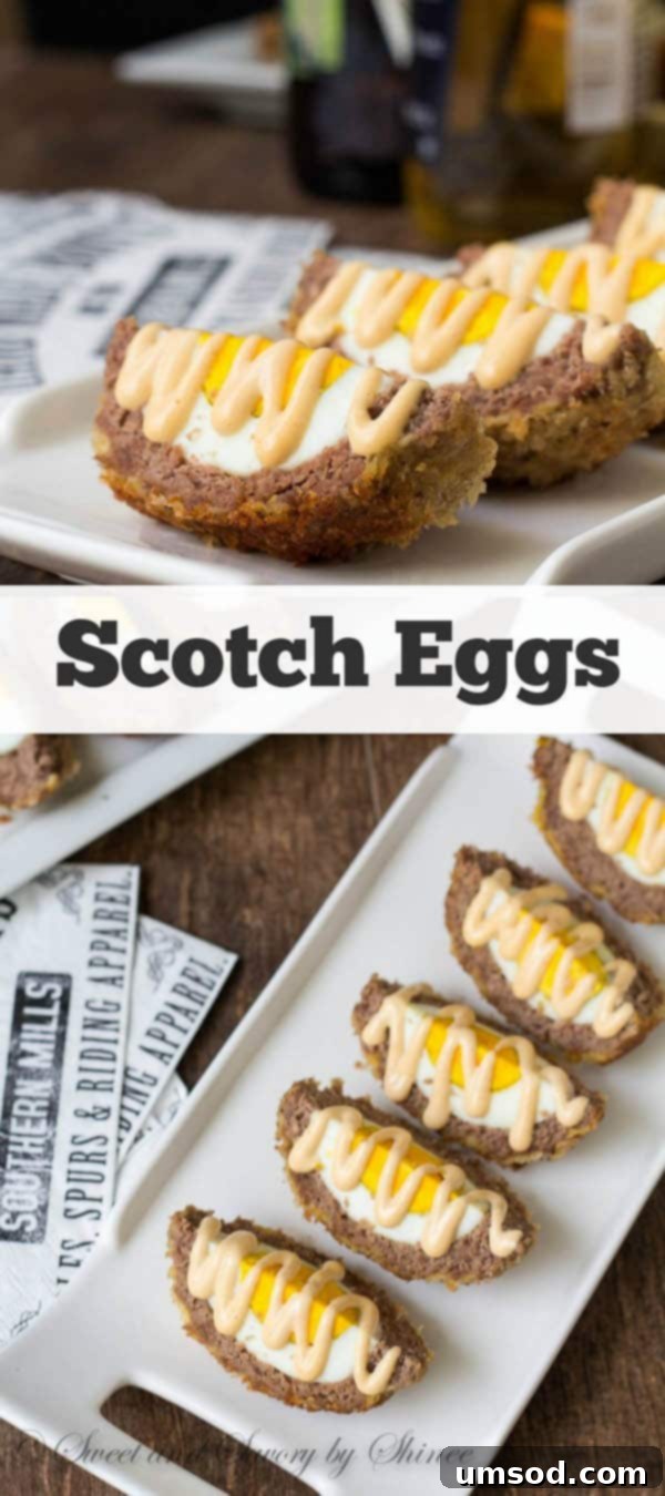 A beautifully presented Scotch egg, sliced to reveal the golden yolk, ready for a party.