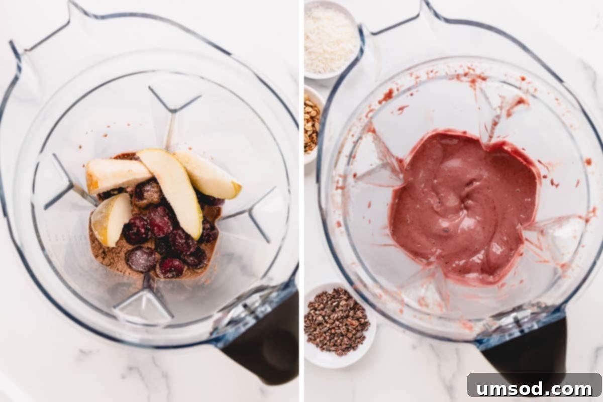 Frozen pear, cherries, and protein powder carefully layered in a blender, illustrating the preparation of the chocolate cherry smoothie blend.