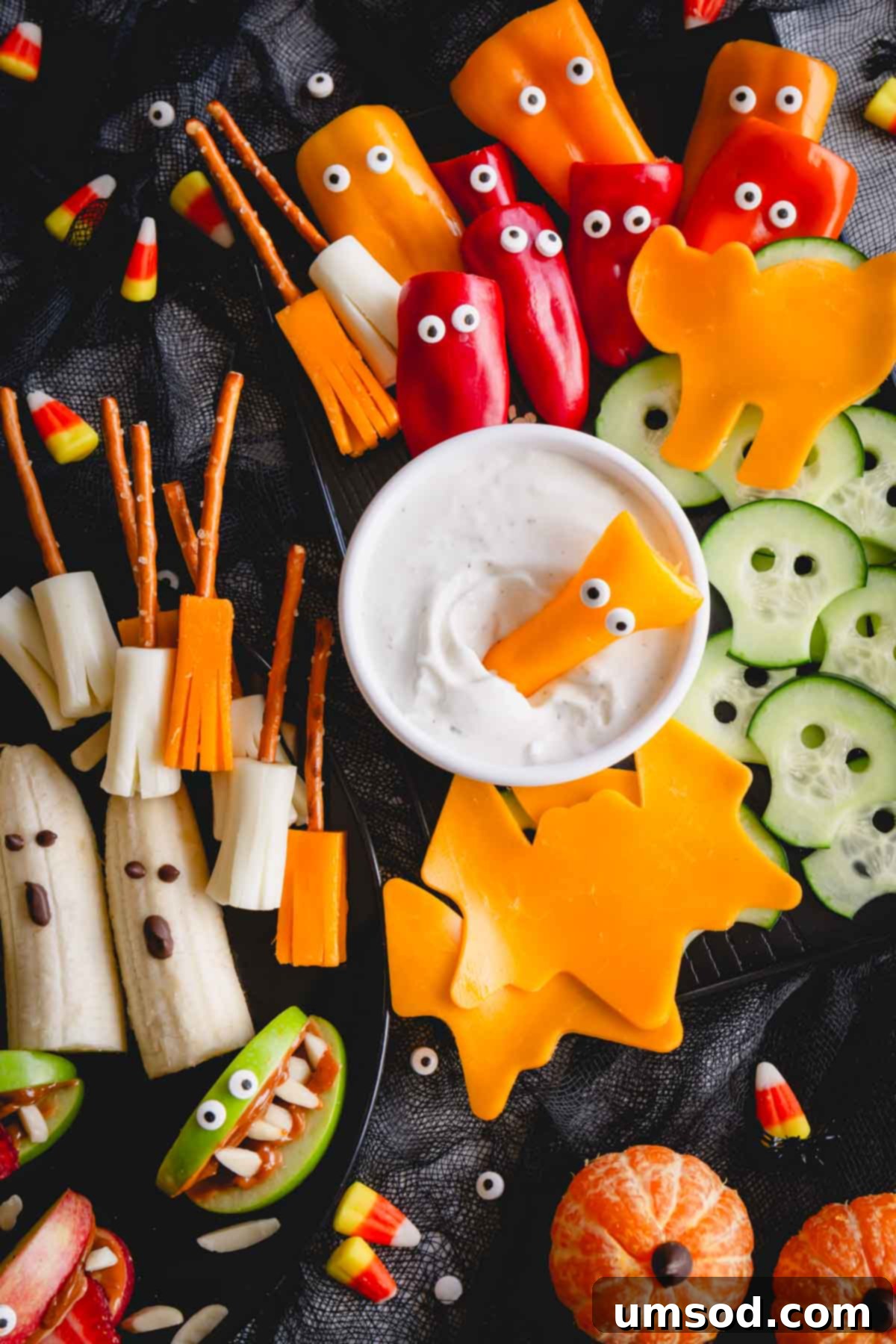 Another overhead image of the healthy Halloween snack board for kids, showcasing variety and vibrant colors.