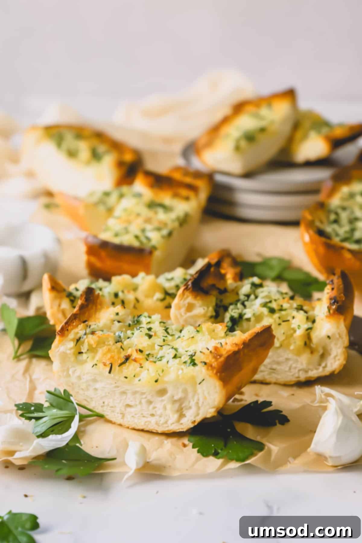 Perfect Garlic Bread in Minutes 3 Pieces of garlic bread topped with an herbed butter spread.