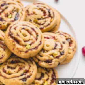 A plate of fig, cranberry, and date pinwheel cookies.