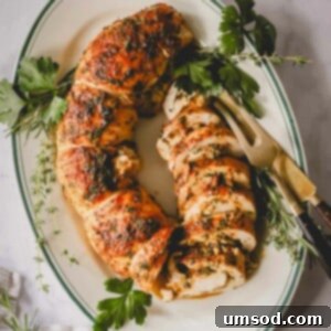 Overhead image of a beautifully sliced stuffed turkey on a serving platter, ready to be enjoyed.