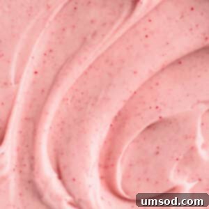 Luscious Raspberry Cream Cheese Frosting 7 Swirled raspberry cream cheese frosting in a bowl, ready to be used.