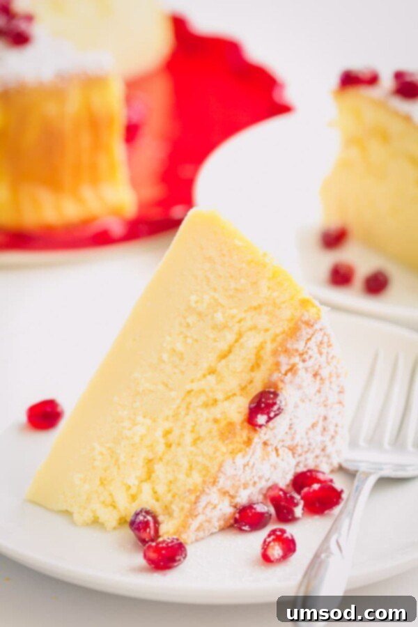 Effortless 3-Ingredient Souffle Cheesecake 3 The smooth, airy batter of the soufflé cheesecake poured into a parchment-lined springform pan, ready for baking.