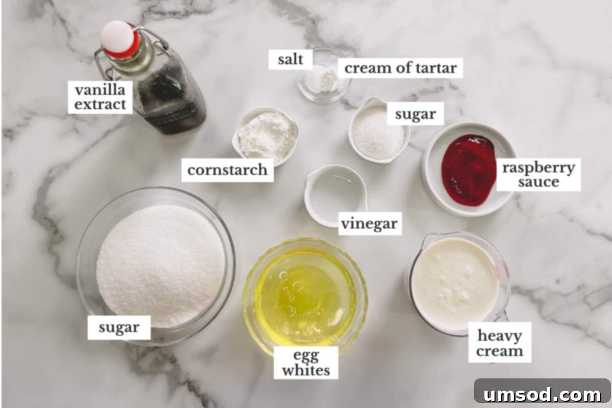 Raspberry Cloud Bites 3 A selection of fresh ingredients laid out for making raspberry pavlovas, including egg whites, sugar, heavy cream, and raspberries.