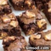 Small image of a stack of Snickers Brownies.