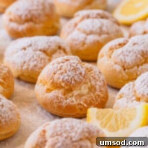 Simple Lemon Curd Recipes 5 Perfectly golden lemon creme puffs dusted with powdered sugar.