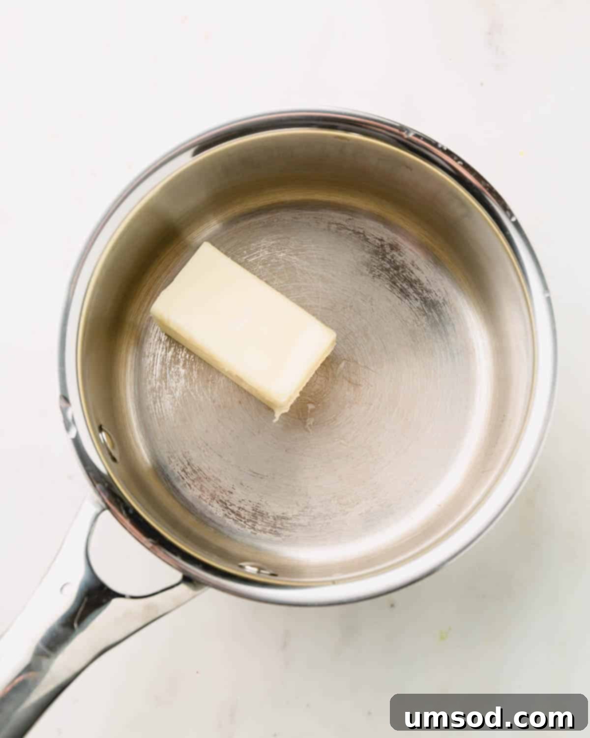 Melting butter in a small saucepan over medium heat.
