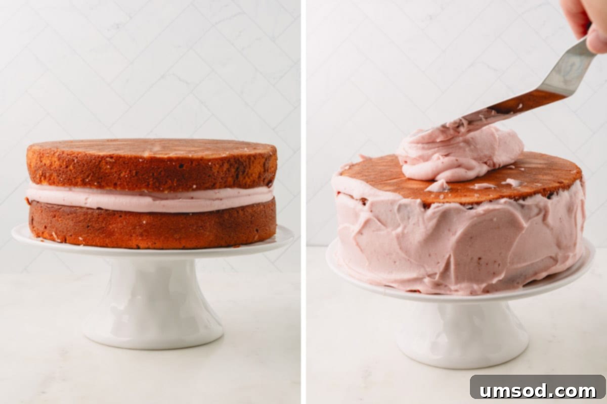 Berry Sweet Symphony 17 Two strawberry cakes on a cake stand stacked with strawberry frosting in the center and being frosted completely.