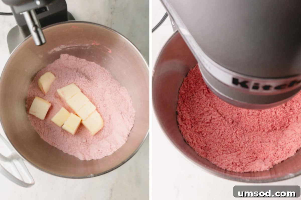Berry Sweet Symphony 9 Butter being mixed into a bowl of freeze-dried strawberry powder.