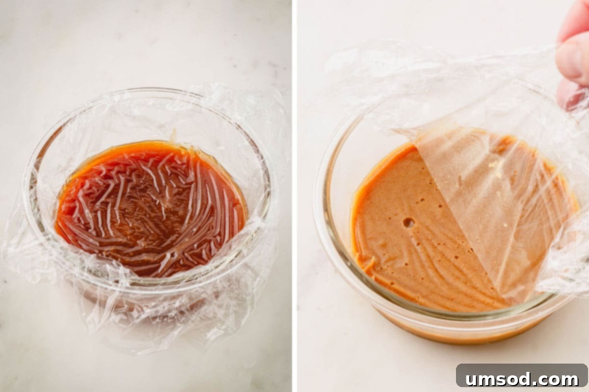 Vegan caramel filling in a bowl, covered with plastic wrap.