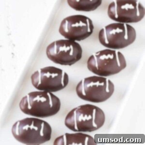 Gourmet Triple Chocolate Oreo Truffles 5 Finished football OREO cookie balls ready for serving