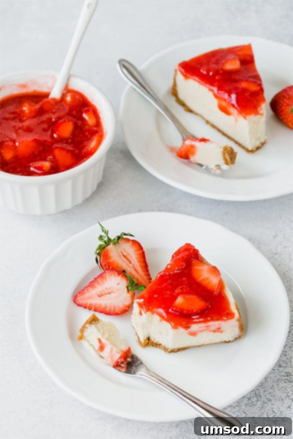 A close-up of a perfectly smooth and creamy Instant Pot cheesecake, highlighting its flawless texture. You won't believe how easy it is to make this perfect cheesecake in an Instant Pot. Truly easy and perfectly customizable cheesecake of your dreams! #easycheesecake #instantpotdessert #instantpotcheesecake #cheesecake