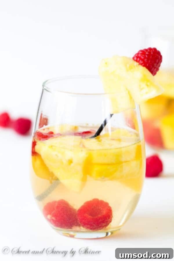 Close-up of vibrant red fresh raspberries, perfect for adding color and tartness to drinks