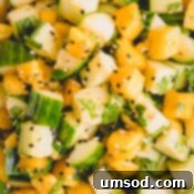 Close-up of fresh cucumber mango salad ingredients