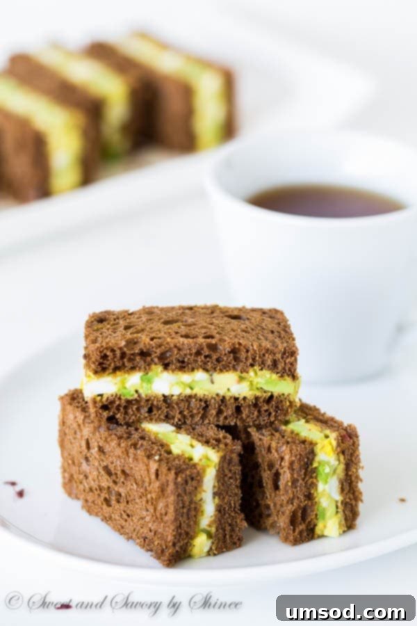 Chili-Kissed Avocado Egg Bites 2 Spicy avocado egg salad sandwiched between chewy pumpernickel bread slices. Perfect texture contrast and flavor combination!