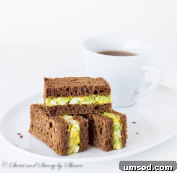 Chili-Kissed Avocado Egg Bites 6 Spicy avocado egg salad sandwiched between chewy pumpernickel bread slices. Perfect texture contrast and flavor combination!