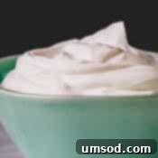 Small bowl of luscious yogurt whipped cream.