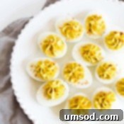 Golden Curry Deviled Eggs 7 A smaller image of the finished Curry Deviled Eggs, emphasizing their appealing presentation.