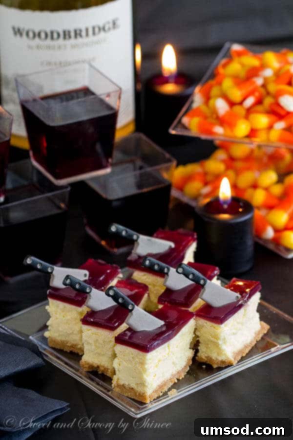 Thick, creamy cheesecake squares topped with a layer of tangy wine gelée. Irresistibly rich and perfect make-ahead dessert!