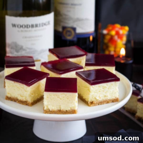 Close-up of the wine gelée cheesecake, highlighting the glossy, jewel-like topping and creamy filling.