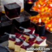 Cheesecake Bars with Wine Gelée ready for serving