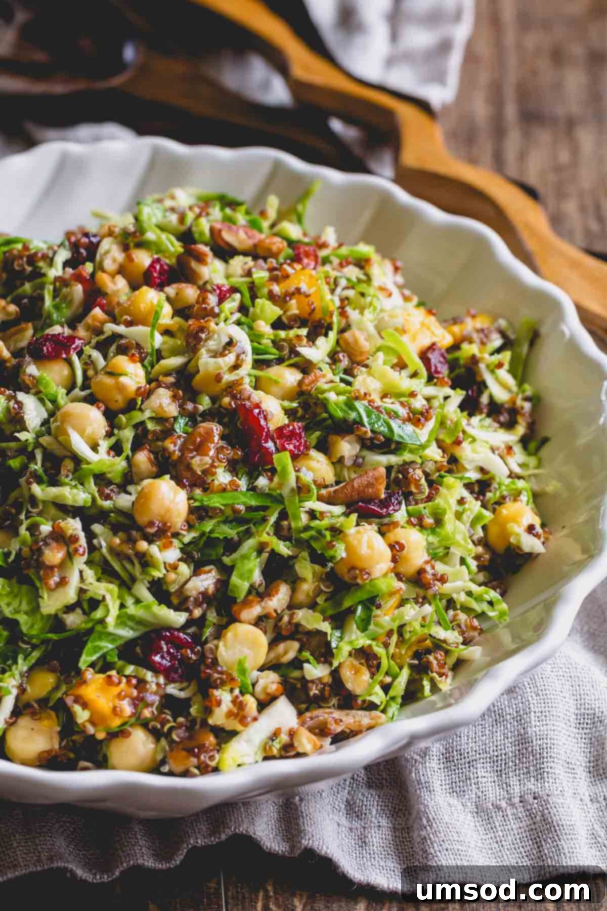 Roasted Brussels Sprout and Warm Quinoa Power Bowl 2 Warm quinoa Brussels sprouts salad with chickpeas in a bowl, ready to be served.
