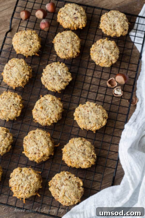 Tropical Hazelnut Treats 4 Hazelnut coconut cookie dough being shaped into balls, ready for baking.