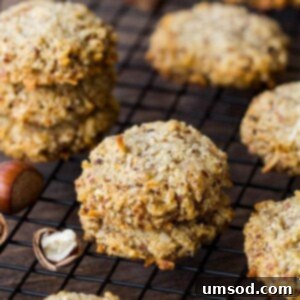 Tropical Hazelnut Treats 6 A plate full of golden brown, chewy hazelnut coconut cookies ready to be enjoyed.