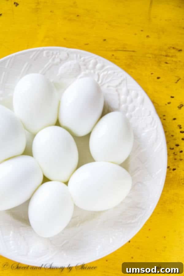 Close-up of perfectly peeled hard-boiled eggs, ready for deviling