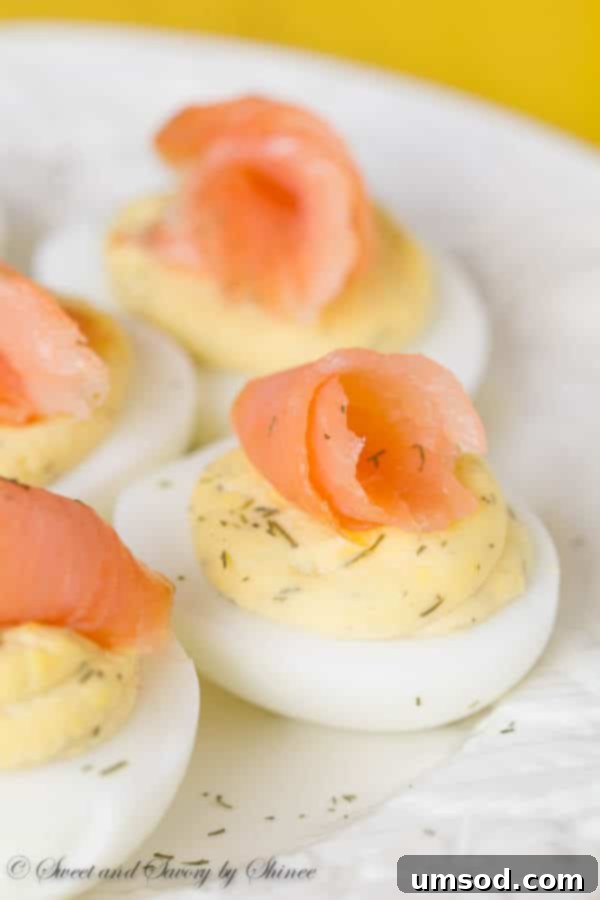 Close-up of Smoked Salmon Deviled Eggs with a focus on the smooth, creamy filling