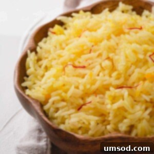 Fragrant Golden Pilaf 10 Saffron Rice in wooden bowl