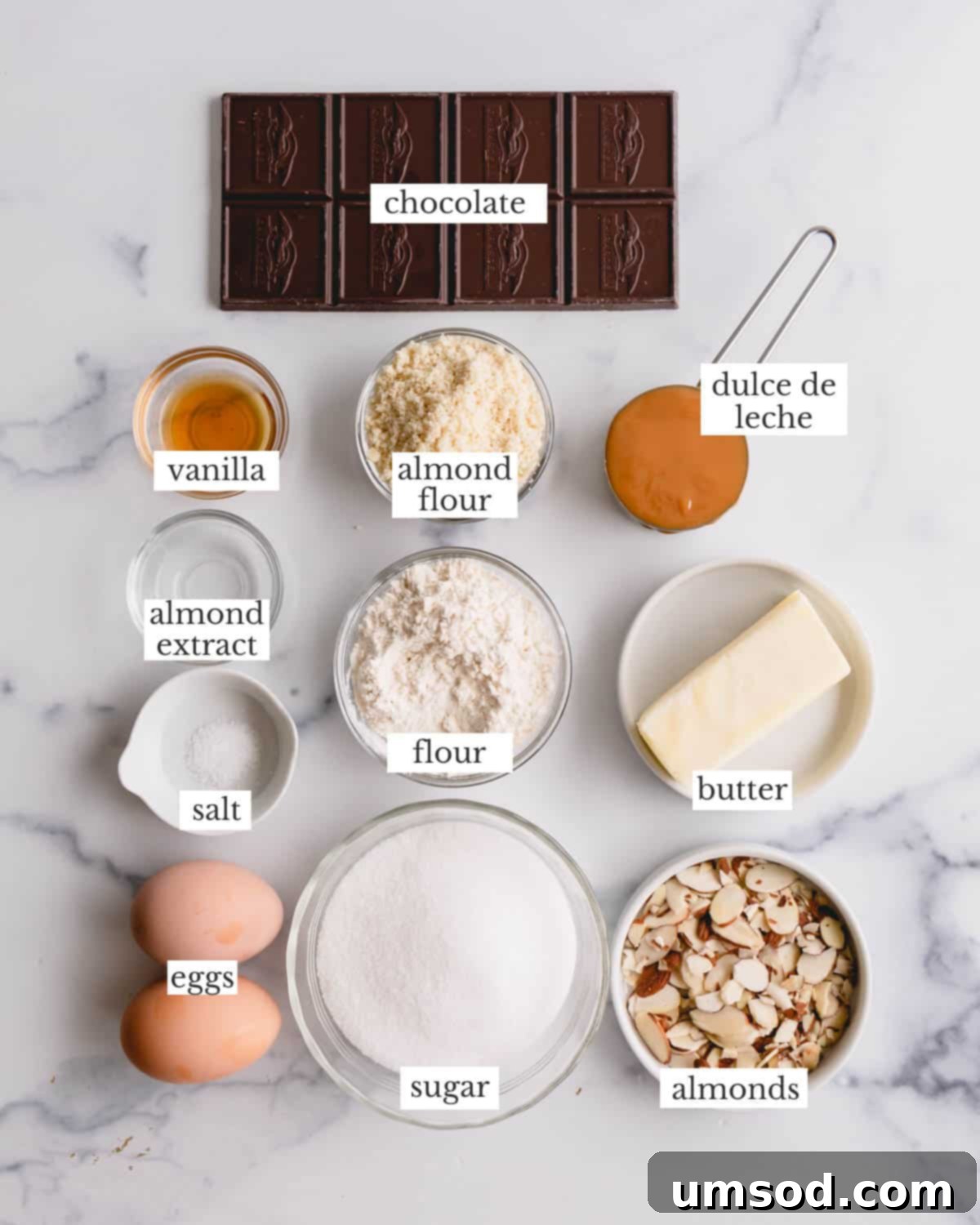 Dulce De Leche Swirled Almond Brownies 4 All the key ingredients for making delicious almond brownies laid out on a surface.