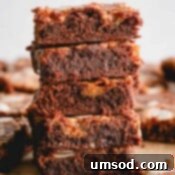 Dulce De Leche Swirled Almond Brownies 9 A beautifully arranged stack of baked almond brownies.