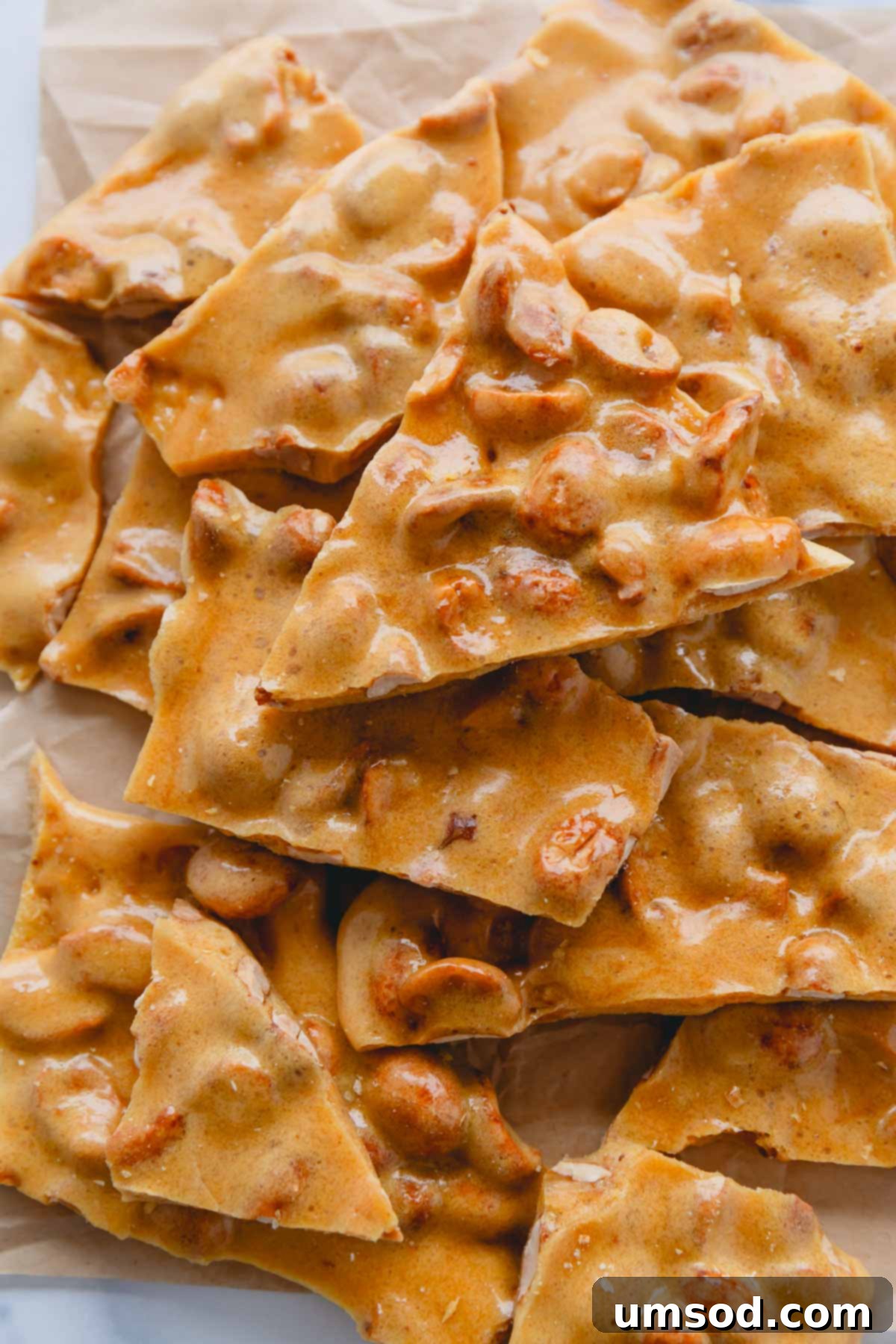 Effortless Microwave Peanut Brittle 9 Finished pieces of crunchy microwave peanut brittle, ready to be enjoyed.