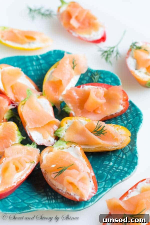 Sweet Pepper Boats with Smoked Salmon 4 The vibrant colors of mini sweet peppers stuffed with dill cream cheese and smoked salmon scream spring, offering freshness, crispness, and natural sweetness.